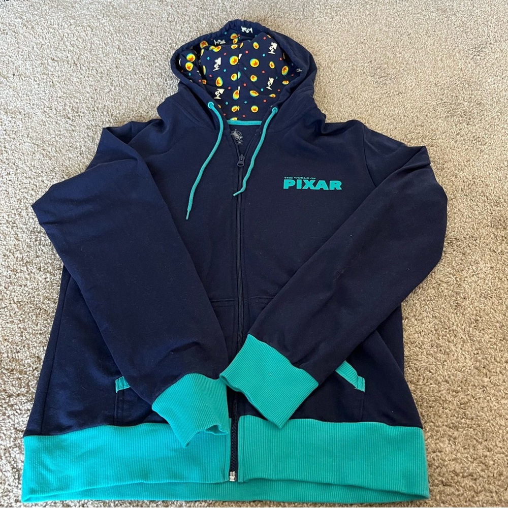 World of Pixar Disney land zip up